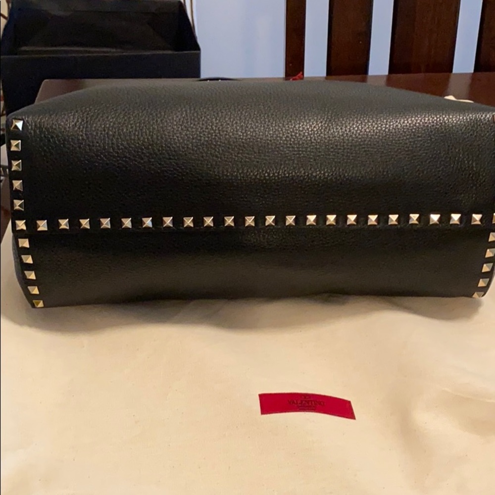 Valentino hand bag with shoulder strap.